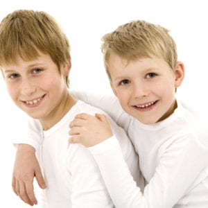 Studio portrait photograph of two young brothers